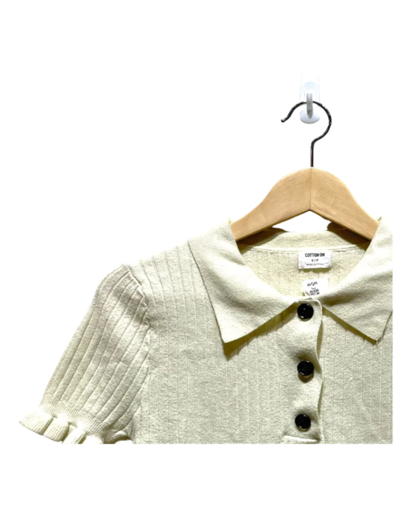 AgAD_A8AAgTQKFQ_processed_large_0 Ivory Ribbed Knit Polo Top in Size S